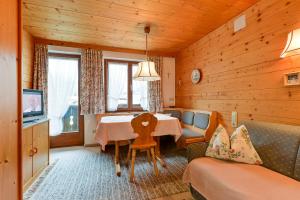 TV a/nebo společenská místnost v ubytování Appartementhaus Holiday