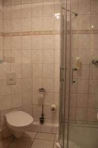 Ein Badezimmer in der Unterkunft Hotel Stolteraa