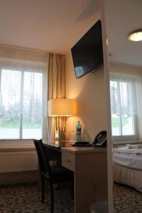 TV a/nebo společenská místnost v ubytování Hotel Stolteraa