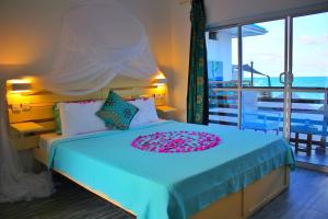 Ένα ή περισσότερα κρεβάτια σε δωμάτιο στο TheSpot