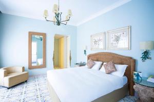 A bed or beds in a room at Terme Manzi Hotel & Spa