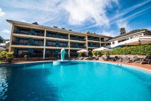 Bazén v ubytování Dolphin Suites nebo v jeho okolí