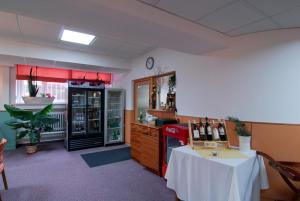 Nápoje v ubytování Hotel KAMU GARNI