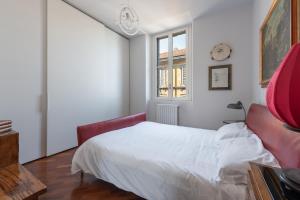 Letto o letti in una camera di Urban District Apartments - Milan Nolo Battaglia 1BR
