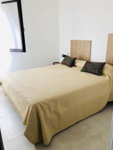 Posteľ alebo postele v izbe v ubytovaní Villa Matu’