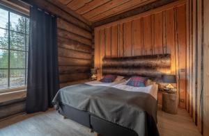 Postel nebo postele na pokoji v ubytování Wilderness Hotel Nangu & Igloos