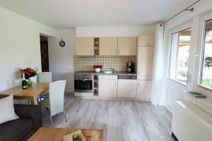 Köök või kööginurk majutusasutuses Zur Alten Boddenfischerei Ferienwohnung Zander