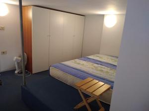 Postel nebo postele na pokoji v ubytování Central Residence