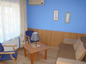 Uma área de estar em Guest House Uzhgorod