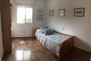 Posteľ alebo postele v izbe v ubytovaní Apartamento Costa del Sol + 22 fotografií