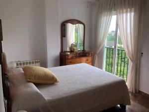Posteľ alebo postele v izbe v ubytovaní Apartamento Costa del Sol