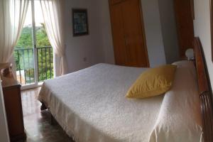 Posteľ alebo postele v izbe v ubytovaní Apartamento Costa del Sol