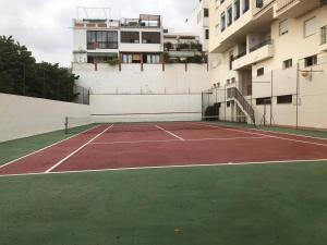 Tenis alebo squash v ubytovaní Apartamento Costa del Sol alebo jeho okolí