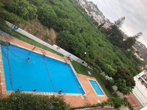 Bazén v ubytovaní Apartamento Costa del Sol alebo v jeho blízkosti