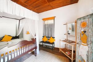 Postel nebo postele na pokoji v ubytování Vihanga Village - Jungle retreat in Dambulla