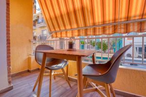 En balkon eller terrasse på Luxury Holiday Apartment Pozo I