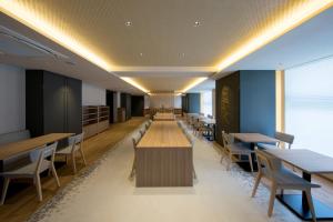 a dining room with tables and chairs and a cafeteria at Shizutetsu Hotel Prezio Kyoto Shijo in Kyoto