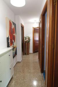 TV a/nebo společenská místnost v ubytování El Rincon de Elena (Garden Apartment)