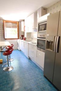 Kuchyň nebo kuchyňský kout v ubytování El Rincon de Elena (Garden Apartment)