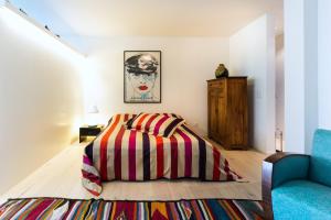 Postel nebo postele na pokoji v ubytování Appartements Hofquartier