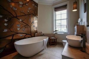 A bathroom at The George Hotel and Beach Club