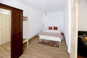 Ένα ή περισσότερα κρεβάτια σε δωμάτιο στο Azeitão Village