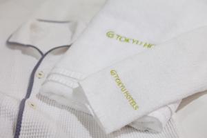 a close up of a white shirt with the wordovation on it at Hiroshima Tokyu REI Hotel in Hiroshima +98 photos