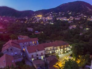 a view of a town at night with lights at B&B Il Girasole in Agerola