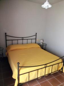 A bed or beds in a room at Rupe delle sorbe