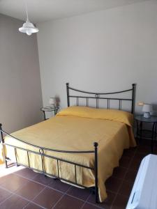 A bed or beds in a room at Rupe delle sorbe