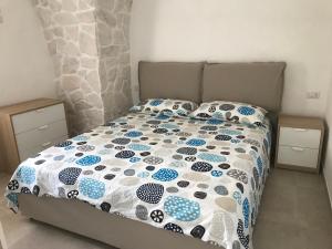 Cama ou camas em um quarto em Fico d’India apartments