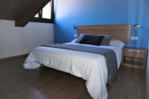 Postel nebo postele na pokoji v ubytování Apartamentos La Playina