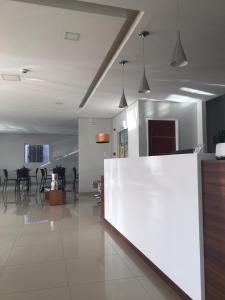 TV a/nebo společenská místnost v ubytování Ilha Bela Hotel