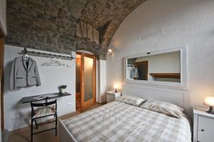 A bed or beds in a room at Agriturismo Crotto Di Somana