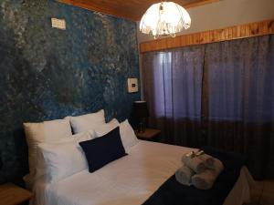 Postel nebo postele na pokoji v ubytování Boh- House