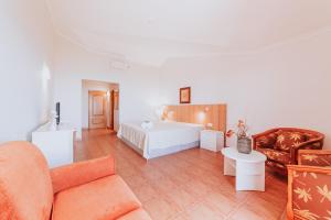 Postel nebo postele na pokoji v ubytování Villa Amore Accommodation