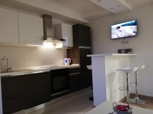 Kuchyň nebo kuchyňský kout v ubytování Apartman Škribulja