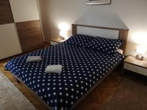 Postel nebo postele na pokoji v ubytování Apartman Škribulja