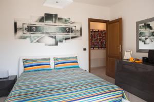 A bed or beds in a room at Viona Apartments