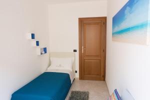 A bed or beds in a room at Viona Apartments