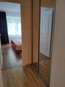 Postel nebo postele na pokoji v ubytování Samanta Apartaments
