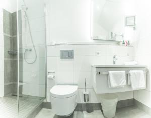 Koupelna v ubytování Akzent Hotel Atrium Baden