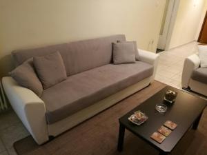 Posezení v ubytování Platos Academy Apartment