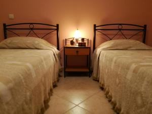 Postel nebo postele na pokoji v ubytování Platos Academy Apartment