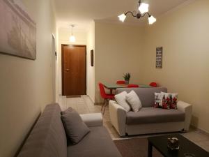 Posezení v ubytování Platos Academy Apartment