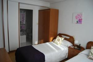 Postel nebo postele na pokoji v ubytování Hotel Abrego Reinosa