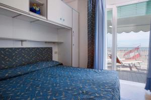 Postel nebo postele na pokoji v ubytování Hotel Sanremo