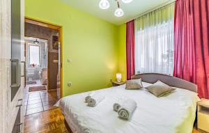 Posteľ alebo postele v izbe v ubytovaní Vila Desire