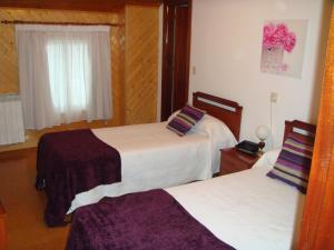 Postel nebo postele na pokoji v ubytování Hotel Abrego Reinosa