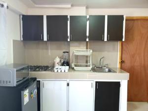 A cozinha ou cozinha compacta de Alojamientos Laila Sai y Zaida
